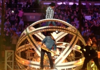 Garth Brooks climbs his signature globe at the TD Garden.
